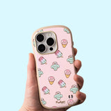 Model holds Pusheen Ice Cream Phone Case. The light-pink case has rounded rubber edges for bump protection. The iPhone case has an all over print of various Pusheen ice cream characters including an ice pop, snow cone, and classic scoop cone.  