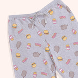 A close-up view of the grey adjustable drawstring on the Pusheen pajama pants. The light grey adjustable ribbon sits in a thin, stretchy waistband.  