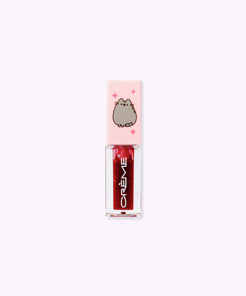 Front view of the Pusheen Lip Oil in Berry Best. The component has a light pink lid and a berry oil color gloss.