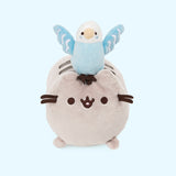 Front view of the Bo and Pusheen plush , in front of a light blue background.