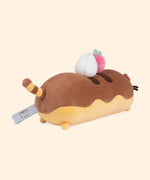 Back quarter view of the plush shows off Pusheen’s striped tail in a yellow and brown iteration.  
