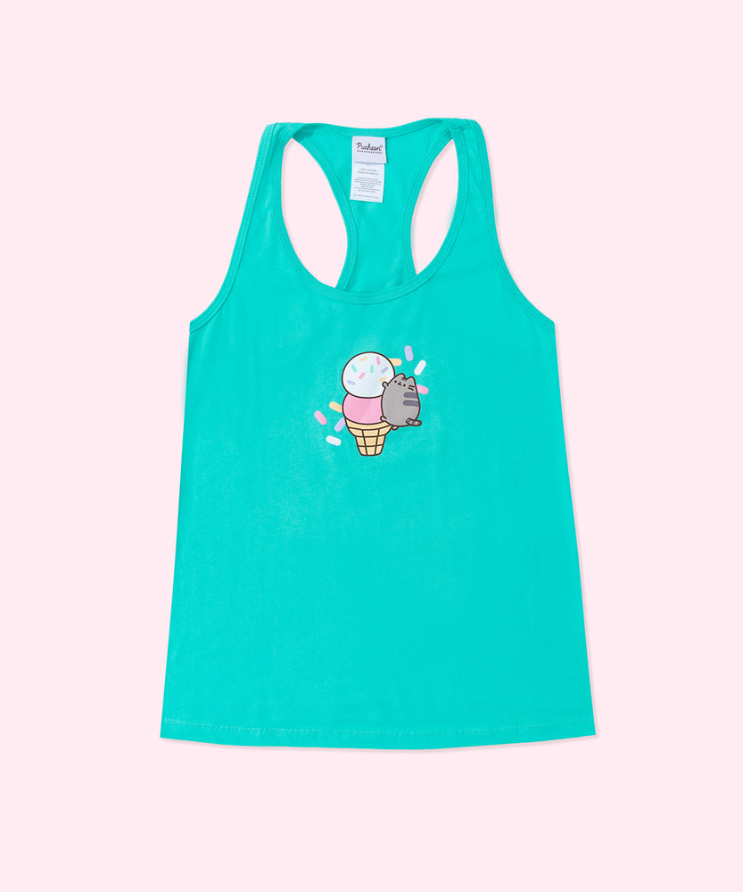 A light teal graphic ladies tank lays against a light pink background. The graphic in the center of the tank top features Pusheen the Cat climbing on a white, pink, and yellow ice cream cone. 