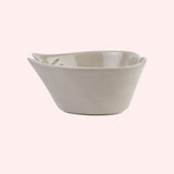 Side angle of bowl to show depth of bowl. The lip of the bowl is wider at the top and narrows to the base making a subtle cone shape.