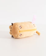 Bottom view of baguette plush keychain that shows the four paws and toe beans embroidered in pink and dark brown.