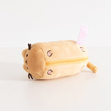 Bottom view of baguette plush keychain that shows the four paws and toe beans embroidered in pink and dark brown.