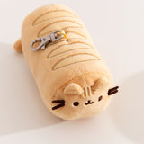 Aerial view of the baking lines atop the baguette themed keychain plush.