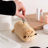 Model holds the lobster claw keychain that attaches to the top of the baguette plush bag holder. 