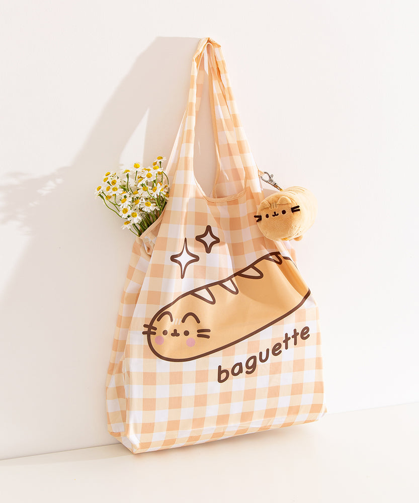 Nylon bag and storage keychain plush bag sat upright on a white background.