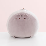 Full view of the front of the extra large squisheen plush of Pusheen. The rounded grey plush has two little paws that extend off the bottom front of the plush.