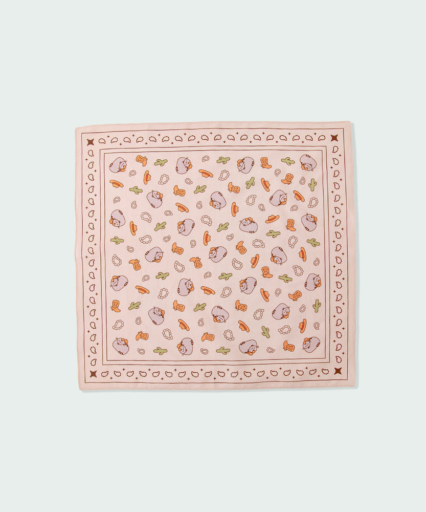 Full-view of the square cowboy bandana. The light brown scarf has a square border print with an all-over-print in the center.