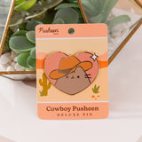 Large pusheen pin has gold foil outline that highlights heart shape of pin.