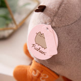 Close-up view of light pink Pusheen logo tag and embossed Pusheen Label tag.