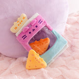 Tortilla chips inspired plush are shown within and outside of the bag of chips plush bag. 