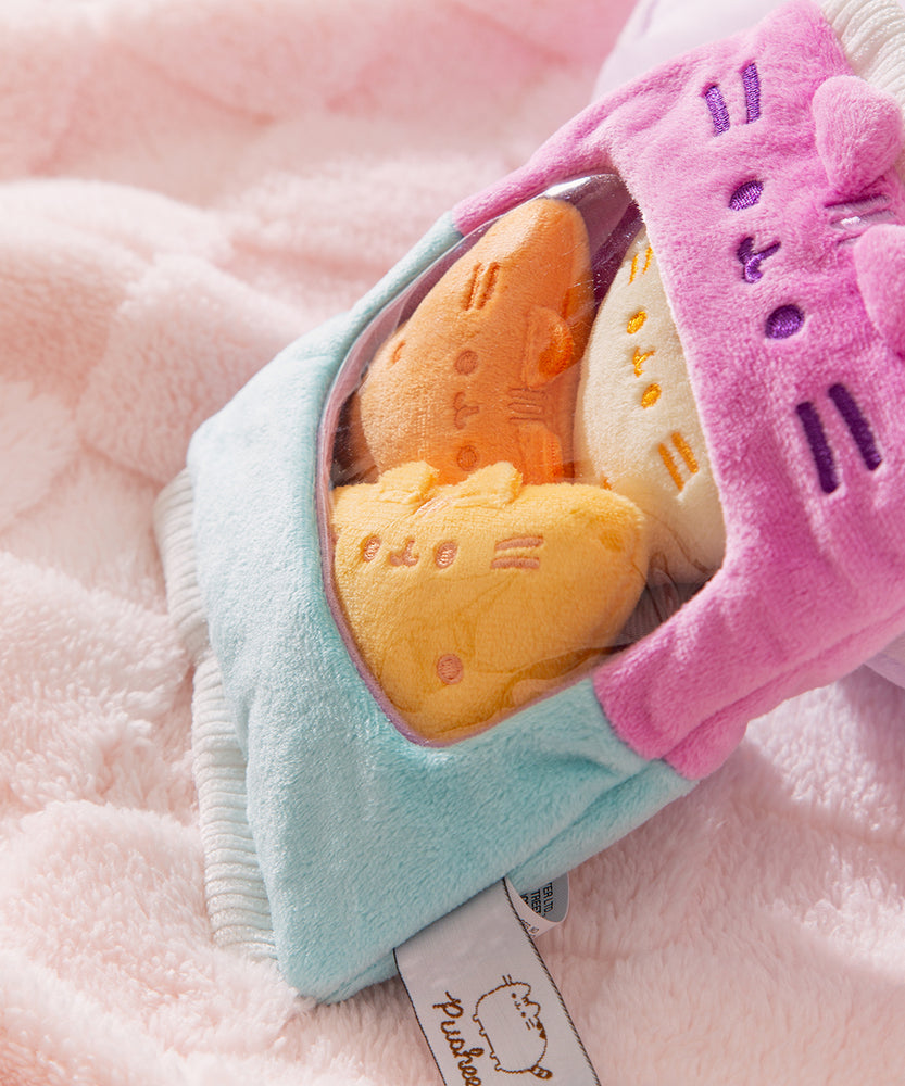 Side view of the Bag of Chips Plush to show the texture of the purple and blue two-toned plush bag.