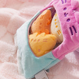 Side view of the Bag of Chips Plush to show the texture of the purple and blue two-toned plush bag.