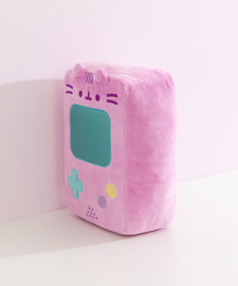 Quarter side view of the Gamer Pusheen Plush. The rectangular plush is wide to mimic the original handheld gaming console's thick shape. 