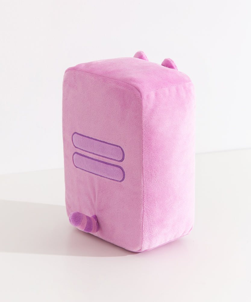 Side and back view of the Pusheen Gamer Handheld Console Plush. Pusheen's two back stripes are embroidered in purple in the middle back of the plush. Extending off the back of the plush is Pusheen's pink and purple striped tail. 