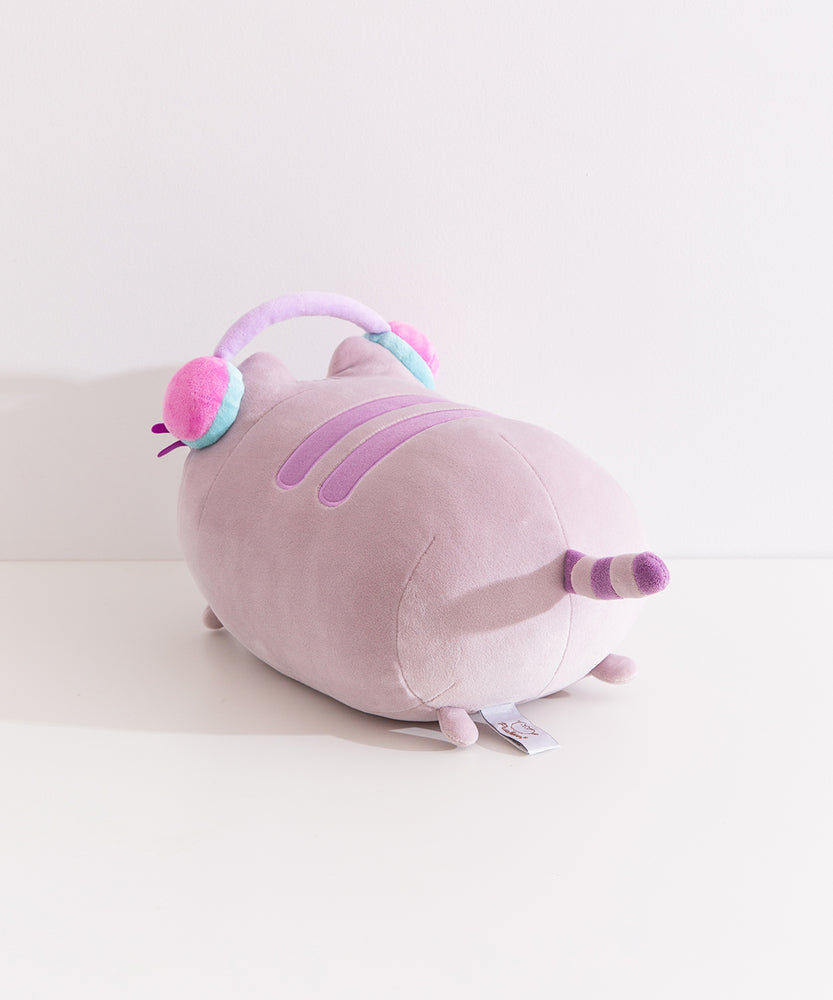 Back view of the gaming pusheen log plush. The cat's purple and gray striped tail can be seen extending off the back of the plush as well as two tiny grey paws behind the plush.