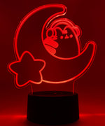 Red neon light shaped with a crescent moon, star, and Pusheen the Cat wearing headphones.