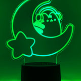 Green neon light shaped with a crescent moon, star, and Pusheen the Cat wearing headphones.
