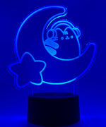 Blue neon light shaped with a crescent moon, star, and Pusheen the Cat wearing headphones.