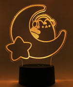 Orange neon light shaped with a crescent moon, star, and Pusheen the Cat wearing headphones.