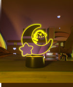 Yellow LED light shaped with a crescent moon, star, and Pusheen the Cat wearing headphones.