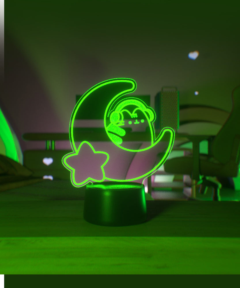 Green LED light shaped with a crescent moon, star, and Pusheen the Cat wearing headphones.
