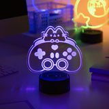 Purple Gaming-themed night light on a desk with blurred background.