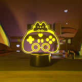 Yellow LED light shaped with Pusheen the Cat and a gaming controller.