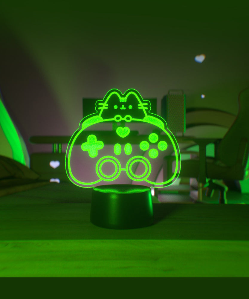 Green LED night light shaped like a gaming controller on a dark background