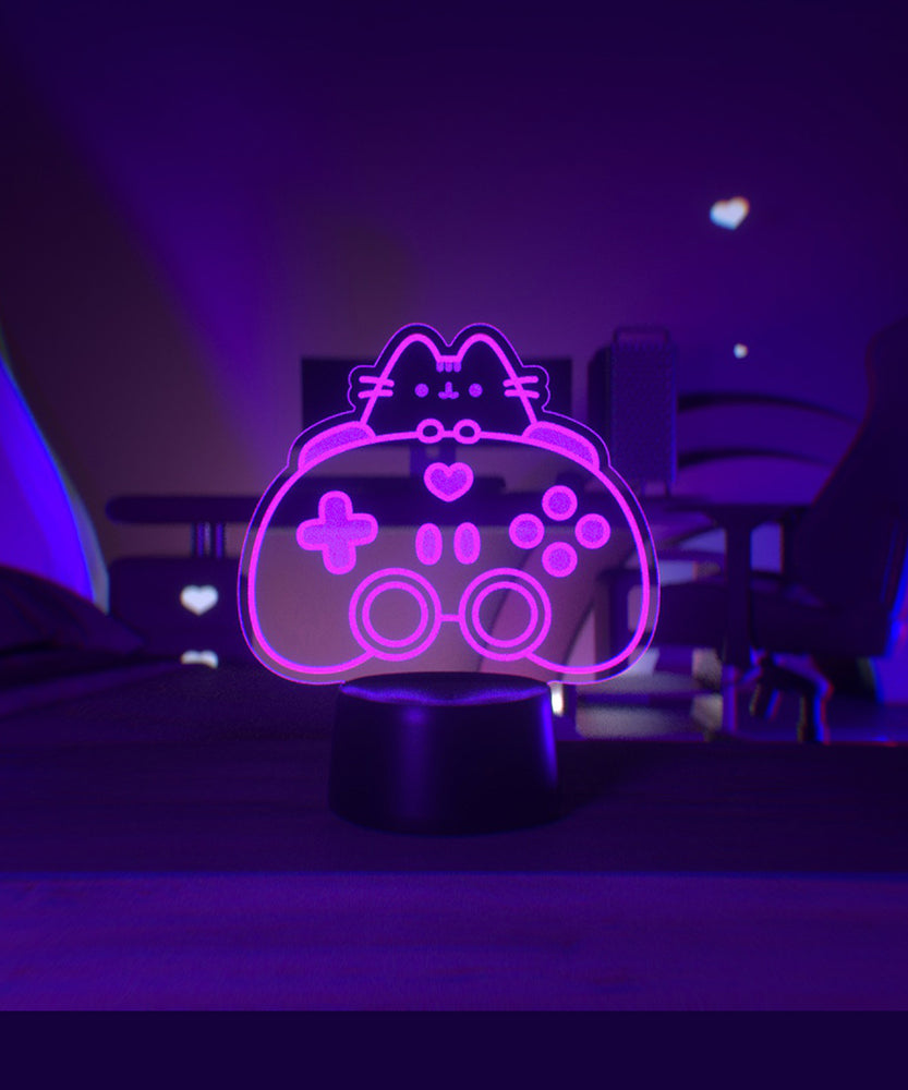 Pink LED light of Pusheen the Cat and a gaming controller.