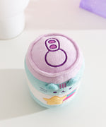 Gamer Pusheen Pop Sup Plush sits next to a coffee mug to demonstrate the size of the energy drink can inspired plush.