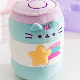 Close-up view of the texture of the Energy Drink Plush. The blue and white striped can has Pusheen's eyes, mouth, and whiskers embroidered in a dark purple thread.