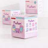 Side view of the gamer blind box packaging. The side view features graphics of all the known plush keychain styles with a darkened graphic with a question mark indicating the mystery plush style of the Gamer Surprise plush collection. 