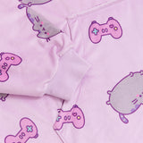 Close-up view of front pocket and the purple sleeve cuff ruching detail. The cuff is designed to stretch. Pusheen the Cat is shown blushing and leaping among pink gaming controllers.