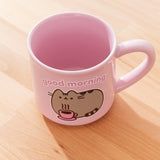 Interior view of the pink Pusheen Good Morning mug. The interior pink color matches the exterior mug color and handle.