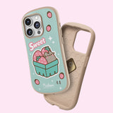View of the outer shell and interior of the Pusheen Fruits Phone Case. The mint green case has a tan bumper and interior lining. The case also has a spot to add a phone charm in the bottom right corner.