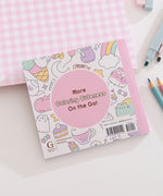 Back cover of the Mini Coloring Book that says "more coloring cuteness on the go!"