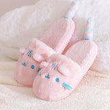 Side view of the fluffy plush slippers the dream-wash fabric is multi-hued pink.