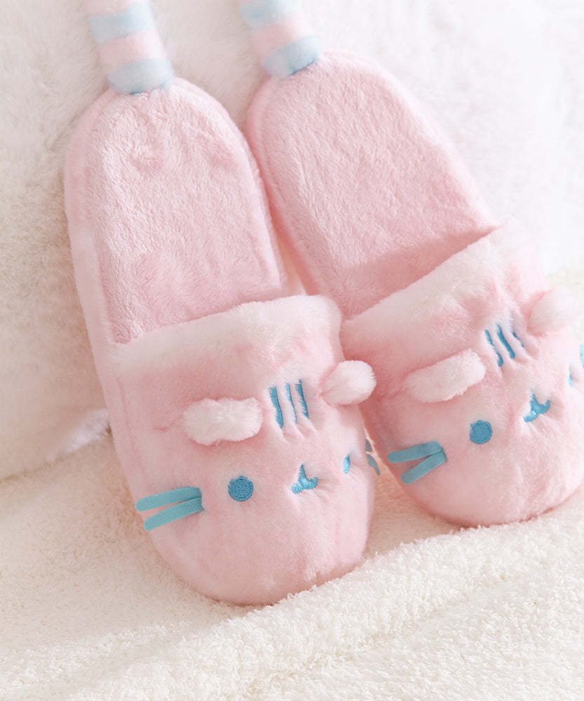 Close-up of the ears and face embroidery details on the Pink Dreamsheen Plush Slippers. 