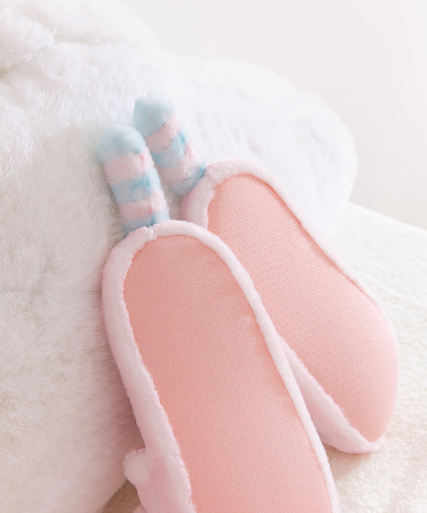 Close-up of textured sole on the bottom of the Pink Dreamsheen Plush Slippers. 