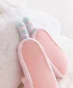 Close-up of textured sole on the bottom of the Pink Dreamsheen Plush Slippers. 