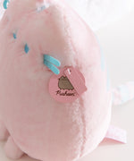 Close-up of the Pusheen Label tag that is attached near the side of the front whiskers. 