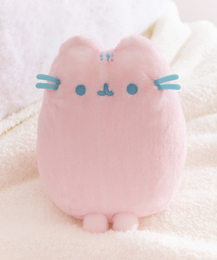 Close-up of the Pusheen Label tag that is attached near the side of the front whiskers. 