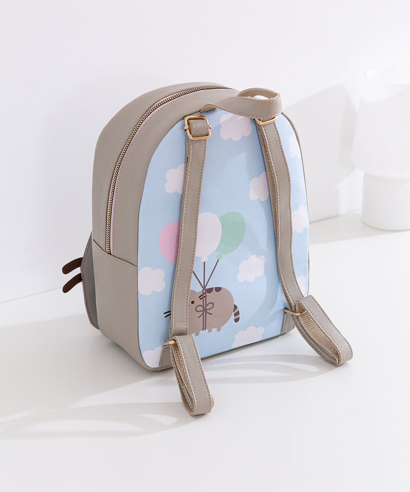 Full view of the back of the anniversary backpack. The pack has a top handle and adjustable grey straps that matches the color of the top of the backpack. 