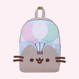 Full front view of the Pusheen backpack. Pusheen's brown whiskers are 3D and extend off the sides of the backpack. 