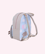 Side and back view of the backpack. The pack has gray adjustable straps with golden hardware. The back of the pack features a graphic of Pusheen the Cat floating through a cloudy sky. 