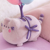 Close-up of the side tie detail that holds the balloons to Pusheen the cat.