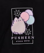 Black Pusheen Sweatshirt hangs on a hanger. The fair-themed crew neck sweatshirt is apart of the Pusheen's 15th Anniversary collection.